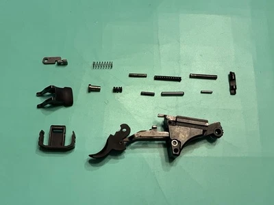 USED OEM WALTHER PK380 LOWER PARTS TRIGGER HAMMER SPRINGS PINS MAG CATCH .380 - Image 1 of 4