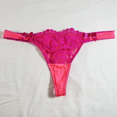 Tanga Victoria's Secret pequeña rosa púrpura lazos de satén Foto 1 de 3