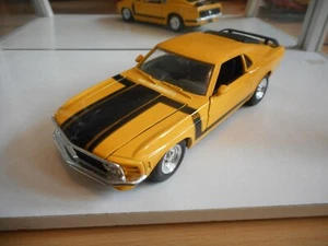 Maisto '70 Ford Boss 302 Mustang in Yellow on 1:24 - Foto 1 di 2