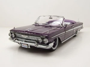Chevrolet Impala Lowrider 1961 morado con suspensión móvil 1:18 Sun Star - Imagen 1 de 13