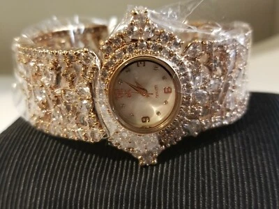 MOTHER OF PEARL DIAL, ROSE TONE BANGLE WATCH 7" - Image 1 of 4