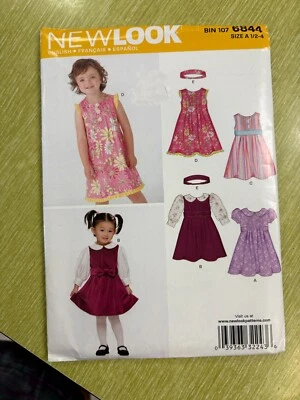 New Look 6844 Vestido Niño Patrón, 4 Vistas Vestidos, Tallas 1/2-4 SIN CORTAR Foto 1 de 2