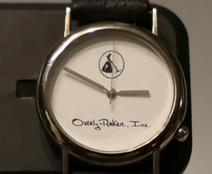RARE VINTAGE OVERLY RAKER INC. SILVER TONE QUARTZ WATCH UNISEX - Picture 1 of 16