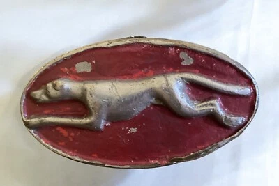 Insignia de parachoques emblema de galgo Lincoln 4" x 2" perro criado sobre base metálica ovalada Foto 1 de 4