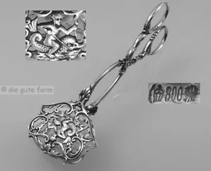 BRUCKMANN Silber 800 Germany - GEBÄCKZANGE - mit Lilien, Putto, Delphin, Dolphin - Bild 1 von 1