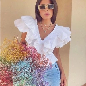 TOP CON VOLANTES ZARA CONTRASTANTE - Imagen 1 de 8