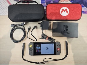 Nintendo Switch Console 32GB HAC-001 w/ 2 Hard Carry Cases Pre-Owned - Picture 1 of 5