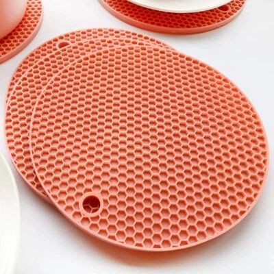 PACK DE 5 SOPORTES PARA MACETAS DE SILICONA ROSA Alfombrillas circulares antideslizantes Remache Resistente al calor BPA Foto 1 de 4