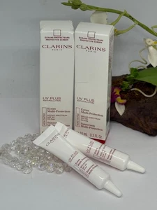 2x Clarins UV Plus Anti-Pollution Non Tinted Sunscreen SPF 50  - .3 oz - Boxed - Picture 1 of 8