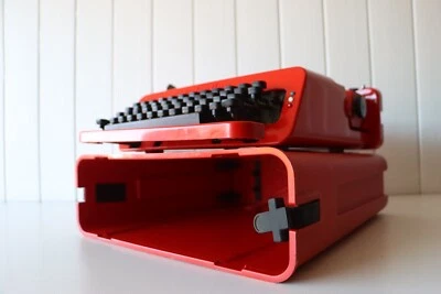 Olivetti Red Typewriter with original case and cleaning brushes - Image 1 of 4