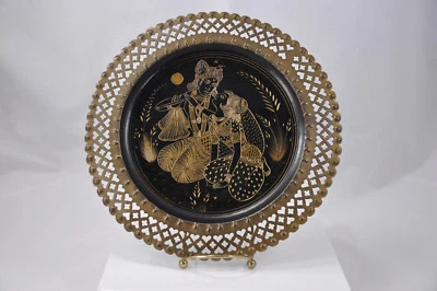 Grabado estilo árabe sobre placa de metal Foto 1 de 4