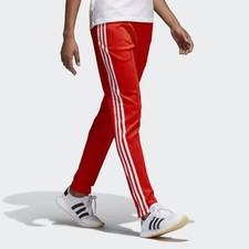 red and black adidas pants