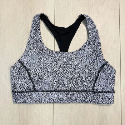 Sujetador deportivo Lululemon blanco y negro moteado con tiras en la espalda para mujer talla 8” Foto 1 de 4