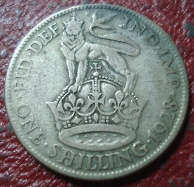1928 BRITISH SHILLING IN GOOD-VG CONDITION (.500 SILVER) - Image 1 of 2