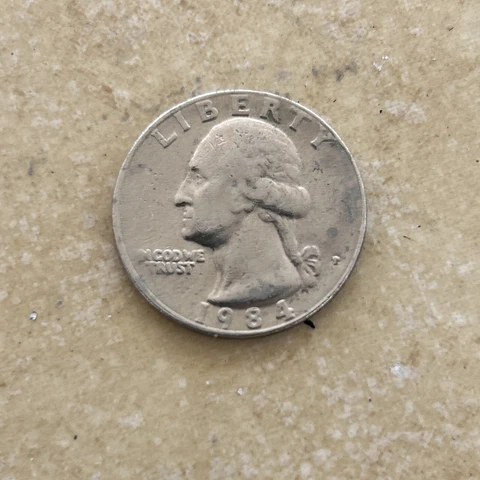 1984 P Quarter Reverse Strike Through error. In God We Trust Missing letters Cover