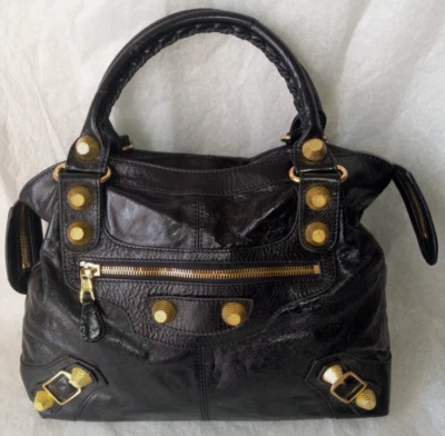 BOLSO DE MANO BALENCIAGA CITY DE CUERO NEGRO Y ORO CON TACHUELAS / HEBILLAS Foto 1 de 4
