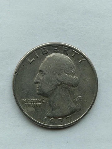 1977-D US Quarter Error - Filled in Mint Mark Cover