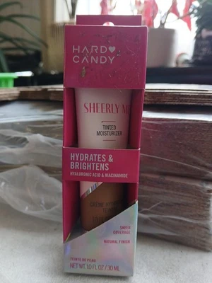 Crema hidratante tintada Hard Candy # 510 Sheerly Me hidrata e ilumina 1,0 fl oz Foto 1 de 2