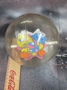Vintage Roll Around Spinning Flutter Balls Toys Sesame Street Big Bird Cookie - Picture 1 of 4