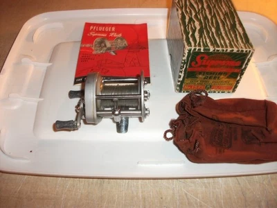 Carrete Pflueger Supreme No.1573 de colección con caja y folleto nivel viento anti pestañas traseras Foto 1 de 4