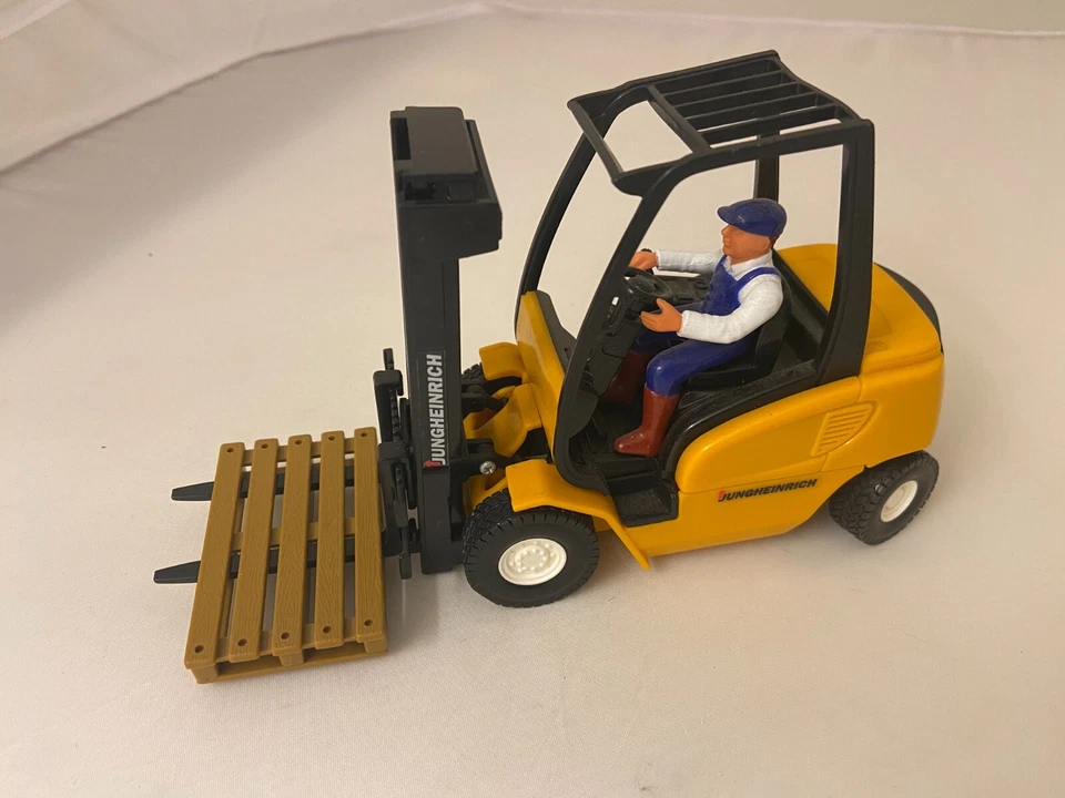 CONRAD JUNGHEINRICH FORKLIFT TOY WITH DRIVER FIGURINE RARE COLLECTIBLE PLASTIC - Image 1 of 4