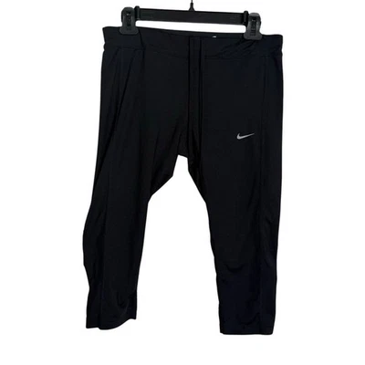 Nike Dri-FIT Black Athletic Capri Pants Reflective Dots Zipper Pocket Women L - Image 1 of 4