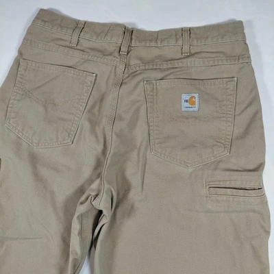 Pantalones caqui resistentes al fuego Carhartt FR talla 34x32 ropa de trabajo utilitaria 2112 CAT 2 Foto 1 de 4