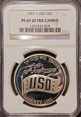 1991 S - USO Proof Commemorative Silver Dollar - NGC PF 69 Ultra Cameo  - Image 1 of 4