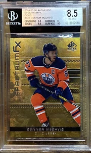 Spectrum FX Gold 2019-20 SP/50 Connor McDavid #S-28 BGS 8,5 - Imagen 1 de 3