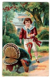 HERMOSA POSTAL VINTAGE DE ACCIÓN DE GRACIAS NIÑO ALIMENTANDO PAVO 1908 082420 P - Imagen 1 de 2