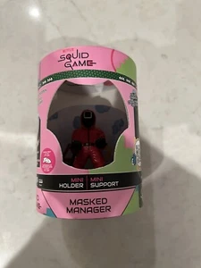 Exquisite Gaming: Holdems: Netflix Squidgames Masked Manager Earbud&Phone Holder - Picture 1 of 3