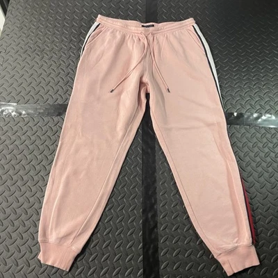 Pantalones de chándal Tommy Hilfiger para mujer medianos rosa a rayas laterales con logotipo Foto 1 de 4