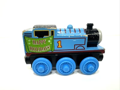 Tren ferroviario de madera Thomas & Friends Happy Holidays Thomas Learning Curve 2003 Foto 1 de 4