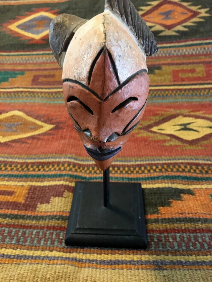 Clay African Art Hand Painted Face Mask Free Standing on Wooden Stand 9" Tall - Image 1 of 4