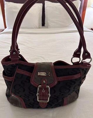 Bolso de hombro Sophia Caperelli de cuero y lona Foto 1 de 4