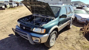 Pinza de freno trasera derecha Passport Passenger 1994-02 con soporte de montaje trasero OEM - Imagen 1 de 8