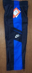 PANTALONES SWOOSH NIKE NEGRO AZUL LOGOTIPO DEPORTIVO NIÑO 4 NUEVOS CON ETIQUETAS - Imagen 1 de 2