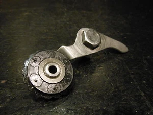 1981 Honda C70 C 70 Passport Motor Camchain Cam Chain Tensioner wheel bracket - Picture 1 of 1