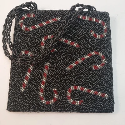 Cartera de noche con diseño de bastón de caramelo de Navidad con cuentas INGE CHRISTOPHER NEGRA  Foto 1 de 4