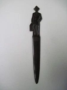 Vintage 7 3/8” FULLER brown plastic letter opener, man with briefcase - Picture 1 of 3