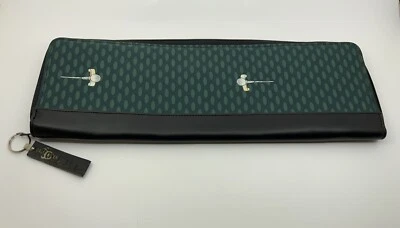 Estuche de viaje con soporte para corbata Nicole Miller verde nailon/cuero con cremallera para golf Foto 1 de 4