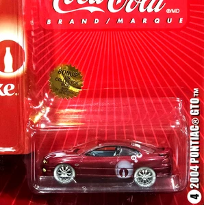 Johnny Lightning CHASE 04 2004 Pontiac GTO WHITE LIGHTNING Coca Cola Car w/Tin - Picture 1 of 3