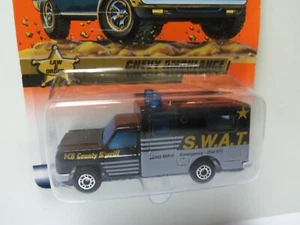 1998 Matchbox Chevy Ambulance #34/100 - Black - SWAT Tampos - MONMC - 1/64 Scale - Picture 1 of 6