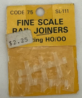 Accesorios de tren modelo Peco: carpinterías de riel a escala fina código aislante 75 Foto 1 de 4