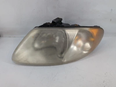 Lámpara de faro izquierda OEM 1030549 para conductor Dodge Grand Caravan 1030549 Foto 1 de 4