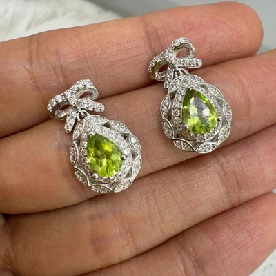 925 Sterling Silver Earrings 7x5mm Green Natural Peridot Gemstone Zircon Bow NEW - Image 1 of 4