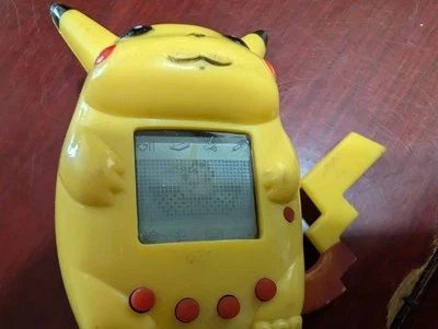 Pokemon Pikachu Tamagotchi electrónico vintage años 90 perfectamente funcional raro Foto 1 de 4