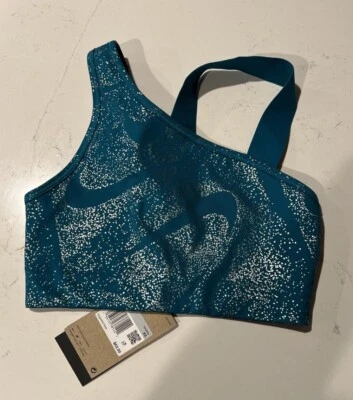 Sujetador deportivo Nike verde azulado/plateado metálico Swoosh asimétrico MS sin relleno DQ5242 XS Foto 1 de 2