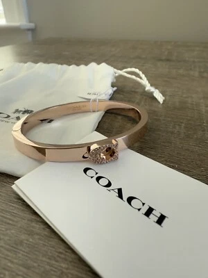 Brazalete con bisagras Coach 91428 Pave Signature cristal oro rosa nuevo con etiquetas Foto 1 de 4