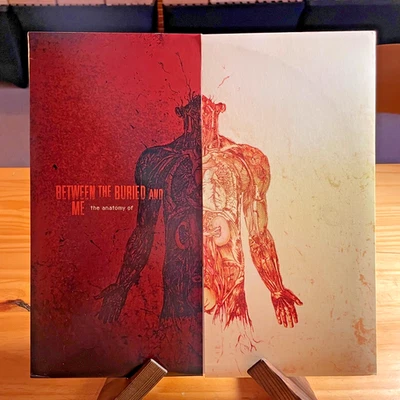 Between The Buried And Me – The Anatomy Of LP RSD 2013 orange color vinyl EX - Image 1 of 4